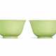 A PAIR OF INCISED LIME GREEN-ENAMELLED `DRAGON` BOWLS - фото 1