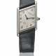 CARTIER. A RARE AND UNUSUAL PLATINUM LIMITED EDITION ASYMMETRICAL WRISTWATCH WITH BOX - фото 1