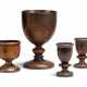 A GROUP OF FOUR FRUITWOOD TREEN CUPS - photo 1