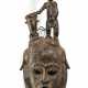 Baule-Maske aus Holz mit Figur und Trommelabschluss, Afrika, Elfenbeinküste - photo 1