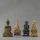 Gruppe von vier Figuren des Buddha Shakyamuni aus Holz mit Lackfassung - Foto 1