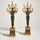 A PAIR OF CONSULAT ORMOLU, PATINATED BRONZE AND ROUGE GRIOTTE MARBLE FIVE-LIGHT CANDELABRA - фото 1