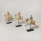 THREE CHINESE PAINTED POTTERY FIGURES OF FEMALE POLO PLAYERS - photo 1