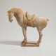 A CHINESE PAINTED RED POTTERY MODEL OF A SADDLED HORSE - фото 1