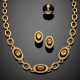 Oval yellow sapphire and diamond yellow gold and black enamel jewelry set comprising - Foto 1