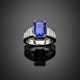 Octagonal step cut ct. 6.26 sapphire with graduated baguette diamond shoulders white gold ring - photo 1