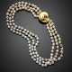 Three strand mm 6.90/7.40 circa cultured pearl necklace with yellow gold clasp and spacers - Foto 1