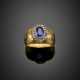 Oval synthetic corundum and rose cut diamond silver and partly chiseled gold ring - фото 1