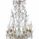 A FRENCH ORMOLU AND MOULDED AND CUT-GLASS TWELVE-LIGHT CHANDELIER - photo 1