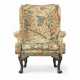 AN ENGLISH MAHOGANY AND CREWELWORK WING ARMCHAIR - photo 1