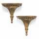 A MATCHED PAIR OF ENGLISH GILTWOOD FLUTED WALL-BRACKETS - photo 1