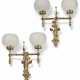 A PAIR OF REFORMED GOTHIC BRASS AND RED-GLASS CABUCHON-SET TWIN LIGHT WALL LIGHTS - фото 1