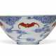 AN IRON-RED-DECORATED BLUE AND WHITE 'FIVE BATS' BOWL - фото 1