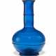 A BLUE GLASS BOTTLE VASE - фото 1