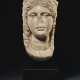 A ROMAN MARBLE HEAD OF ISIS - photo 1