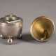 AN EGG-SHAPED INKWELL AND TABLE BELL - фото 1