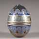 A SILVER AND CHAMPLEVÉ ENAMEL EGG - Foto 1