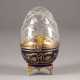 A EGG-SHAPED SILVER-GILT, CUT-GLASS AND PORCELAIN BOX WITH EAGLE WITHIN ORIGINAL FITTED CASE - Foto 1