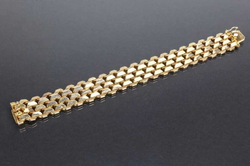 Auktion: Sehenswertes breites Gold-Armband, Gelbgold 750 / 18 Karat