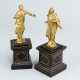 A pair of manieristic bronze sculptures of Maria in folded dress spreading the arms - photo 1