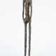 Bronze sculpture standing man on marble base - фото 1