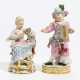 Porcelain figurines of boy with stick horse and lady feeding kitten - photo 1
