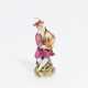 Porcelain figurine of a packpipe player - photo 1
