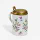 Porcelain tankard with floral relief décor - фото 1