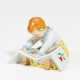 Porcelain figurine of child with picture-book - photo 1