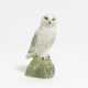 Small porcelain figurine of an arctic owl on rock - Foto 1