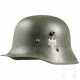 Stahlhelm M 17/34 des Heeres mit beiden Abzeichen - фото 1