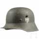 Stahlhelm M 18/34 des Heeres mit einem Abzeichen - фото 1