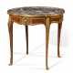 A FRENCH ORMOLU-MOUNTED KINGWOOD AND MAHOGANY GUERIDON - фото 1