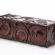 Solid wood chest of drawers decorated in carving with abstract circular and linear motifs, base covered in metal with linear embossed decorations - фото 1