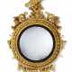 A CLASSICAL EAGLE-CARVED GILTWOOD CONVEX MIRROR - Foto 1