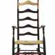A WILLIAM AND MARY BLACK-PAINTED MAPLE SLAT-BACK ROCKING ARMCHAIR - Foto 1
