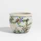 Small jar with birds and flowering peach tree - photo 1