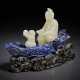 A RARE WHITE JADE AND LAPIS LAZULI CARVING OF FIGURES IN A LOG BOAT - photo 1