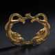 A SMALL GILT-BRONZE DOUBLE DRAGON FITTING - фото 1