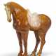 A LARGE AMBER-GLAZED POTTERY FIGURE OF A HORSE - фото 1