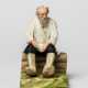 A RUSSIAN PORCELAIN FIGURE SHOWING AN OLD MAN - photo 1