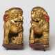 TWO CHINESE GILDED WOODEN GUARDIAN LIONS - фото 1