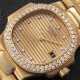 PATEK PHILIPPE, NAUTILUS REF. 4700/3, A GOLD AND DIAMOND-SET WRISTWATCH - Foto 1