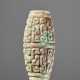 A BARREL-SHAPED BEAD DECORATED WITH THE PANHUI PATTERN OF SWARMING CURLS - фото 1