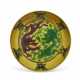 A SMALL YELLOW-GROUND AUBERGINE AND GREEN-ENAMELED 'DRAGON' DISH - фото 1