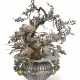 A JAPANESE EXPORT SILVER, MIXED-METAL, AND ENAMEL FIGURAL FLORAL CENTERPIECE - photo 1