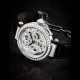 CARTIER. AN ATTRACTIVE 18K WHITE GOLD, DIAMOND, TSAVORITE AND ONYX-SET SKELETONISED WRISTWATCH - фото 1