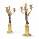 A PAIR OF EMPIRE ORMOLU AND PATINATED-BRONZE THREE-BRANCH CANDELABRA - фото 1