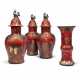 A GARNITURE OF THREE CONTINENTAL RED, BLACK AND PARCEL GILT JAPANNED FAYENCE BALUSTER VASES AND COVERS AND A FLARED BEAKER VASE - photo 1