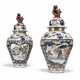 A PAIR OF CONTINENTAL FAIENCE IMARI BALUSTER VASES AND COVERS - photo 1
